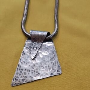Postmodern Hammered Pendant on a Snake Chain by Marjorie Baer
